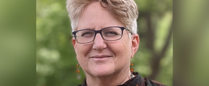 photo of woman, with glasses, outdoors