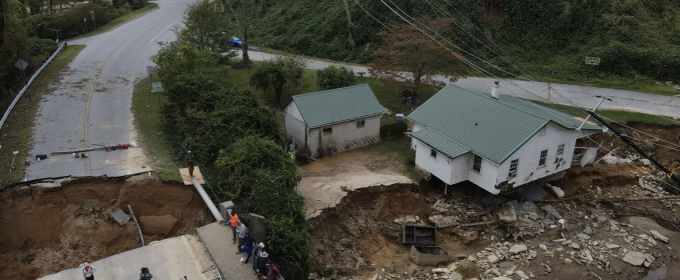 aerial photo of storm damage, road collapse