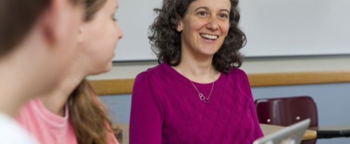 woman in classroom with students