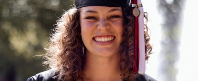 photo of woman in cap and gown