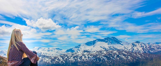 woman with mountain and sky