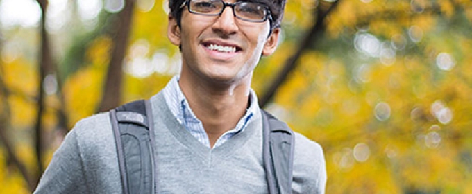 man outside with backpack