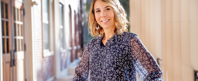 Photo of woman on building porch, day