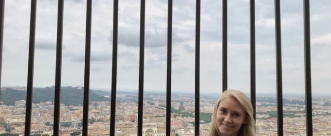 photo of woman infant of a view of Rome