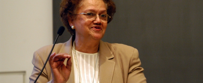 photo of woman at lectern with microphone