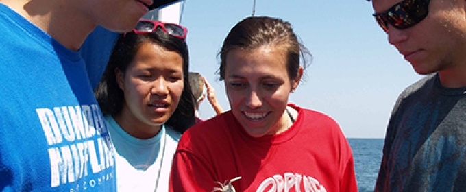 students on a boat, water