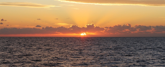 photo of sunrise over ocean