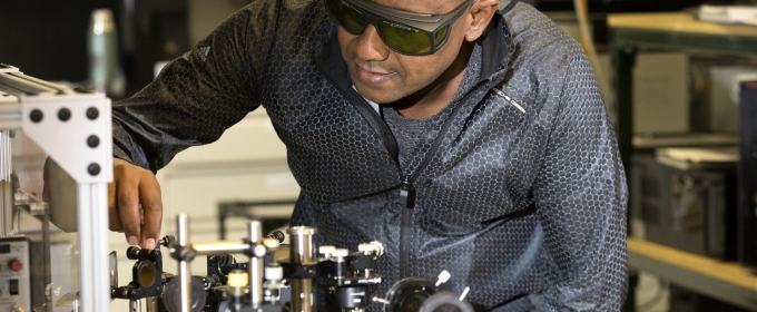 photo of man in lab with protective eyewear