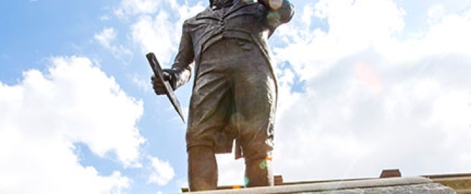 Baldwin statue from below