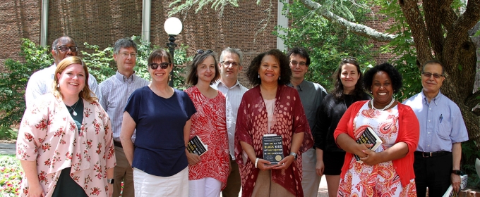 Group photo of 11 people, outdoors