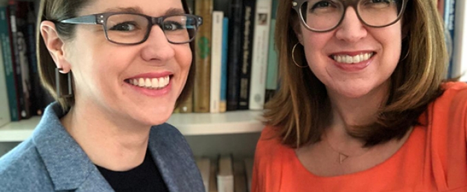 photo of two women in front of bookshelf