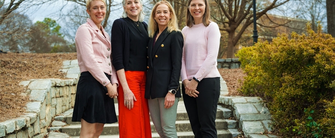 photo of four women on walkway, day