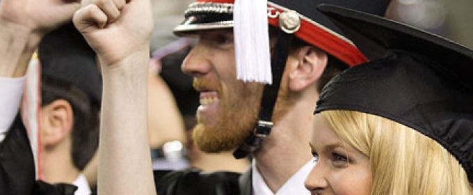 man and woman graduating