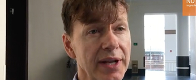 screenshot of man interview in video