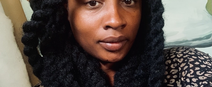 headshot of woman, with painting in background