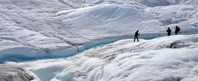 glacier melting, with people