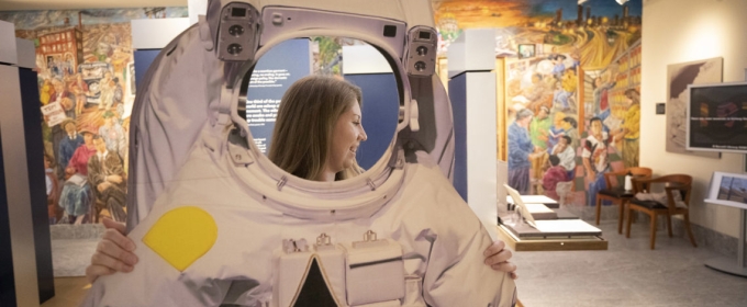 photo of woman with astronaut suit