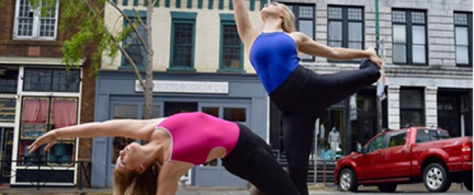 dancers posed on a street