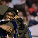 photo of graduates embracing
